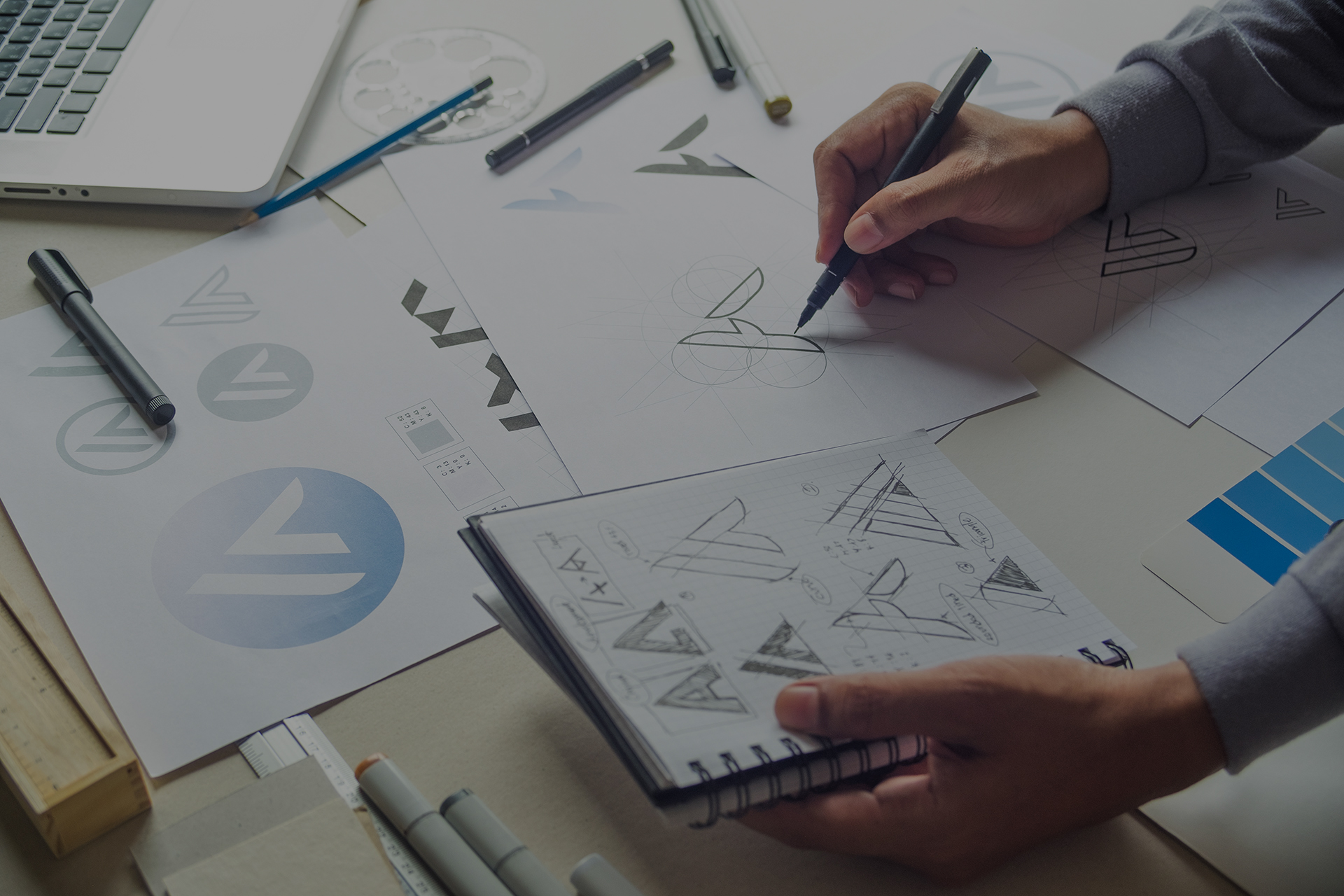 Graphic designer drawing sketch design creative Ideas draft Logo